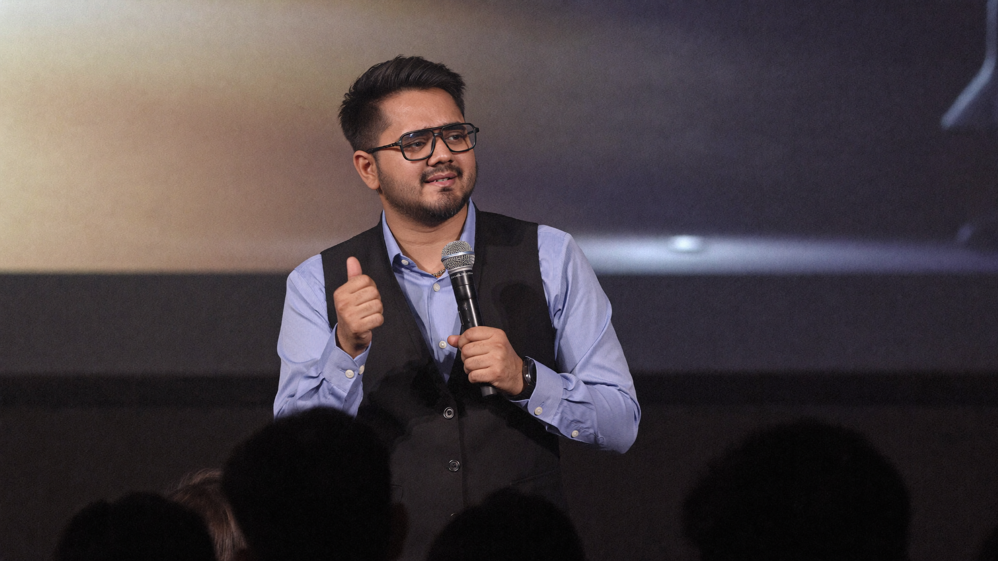 Sagar Shah speaking on stage